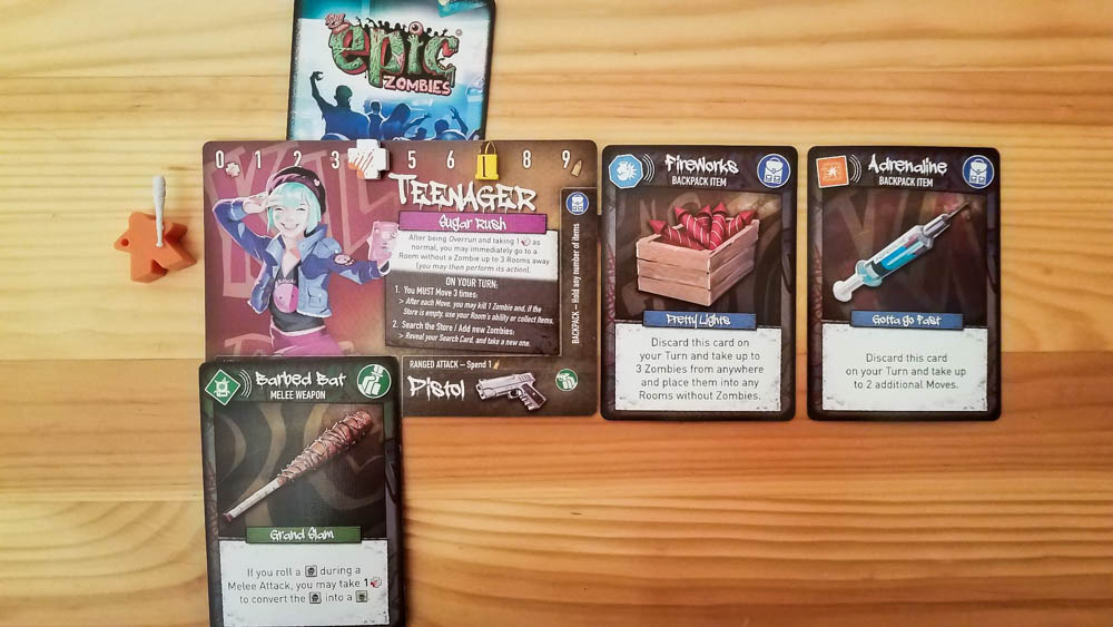 Tiny Epic Zombies review - human and her cards